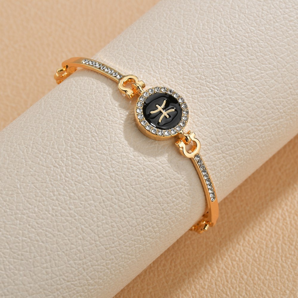 Wholesale Drip Oil 12 Constellation Gold Rhinestone Alloy Bracelet